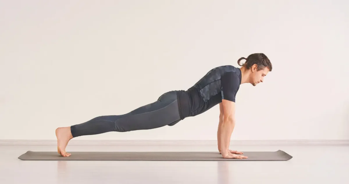an image of a man doing push-ups ecercise for lose weight