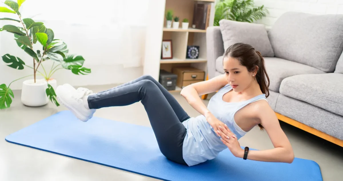 an image of aldy doing russian twits exercise for weight loss